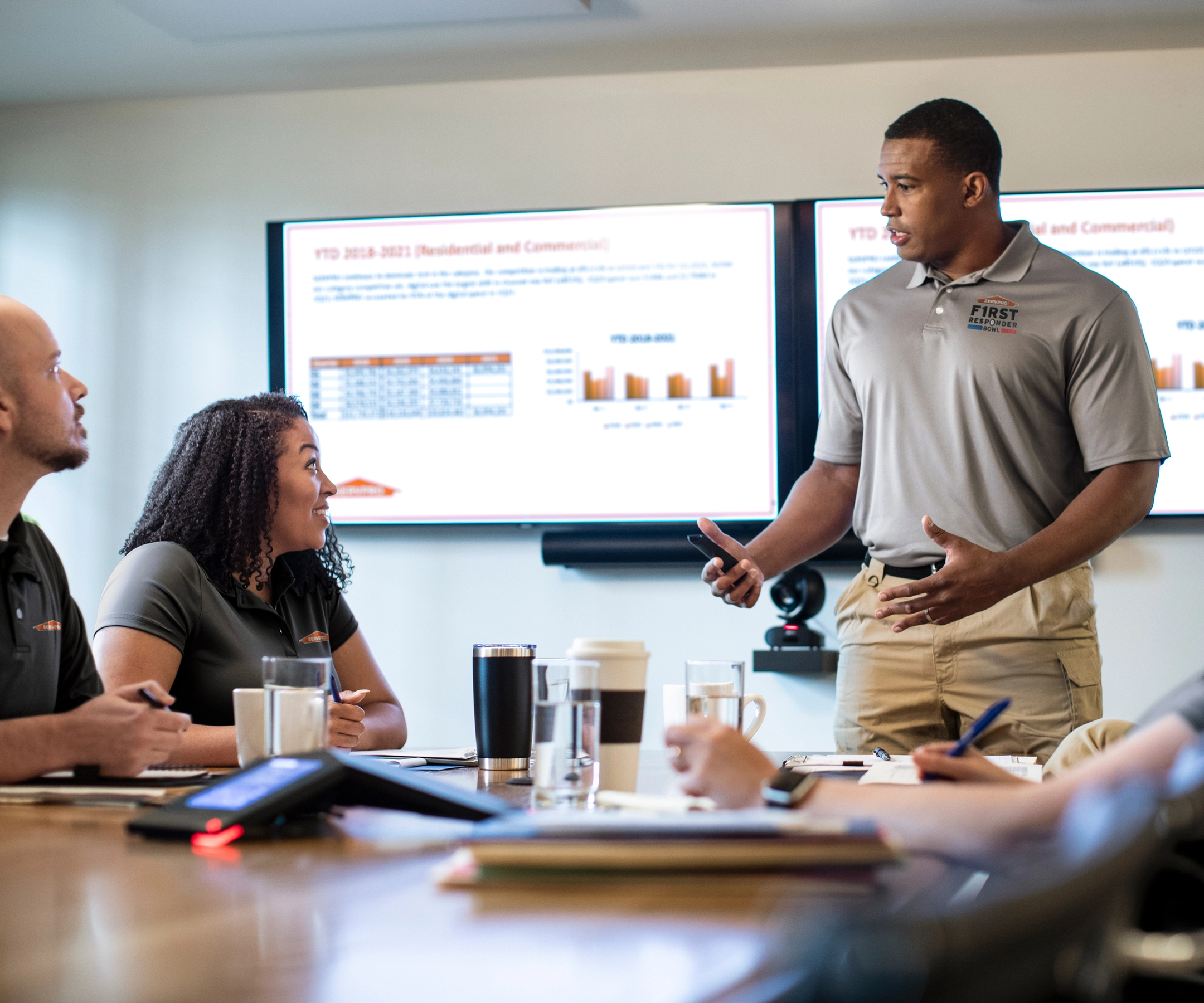 3 workers discussing with each other in a meeting
SERV1444 Three Year usage. Limited to Internal use at corporate on digital, social and website, with three yea print usage beginning 10/1/2021